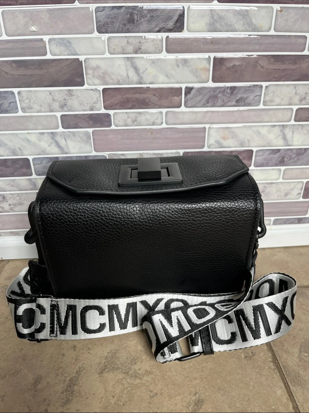 Steve Madden Bkween camera cross body bag with logo taping strap in black - Picture 15 of 17